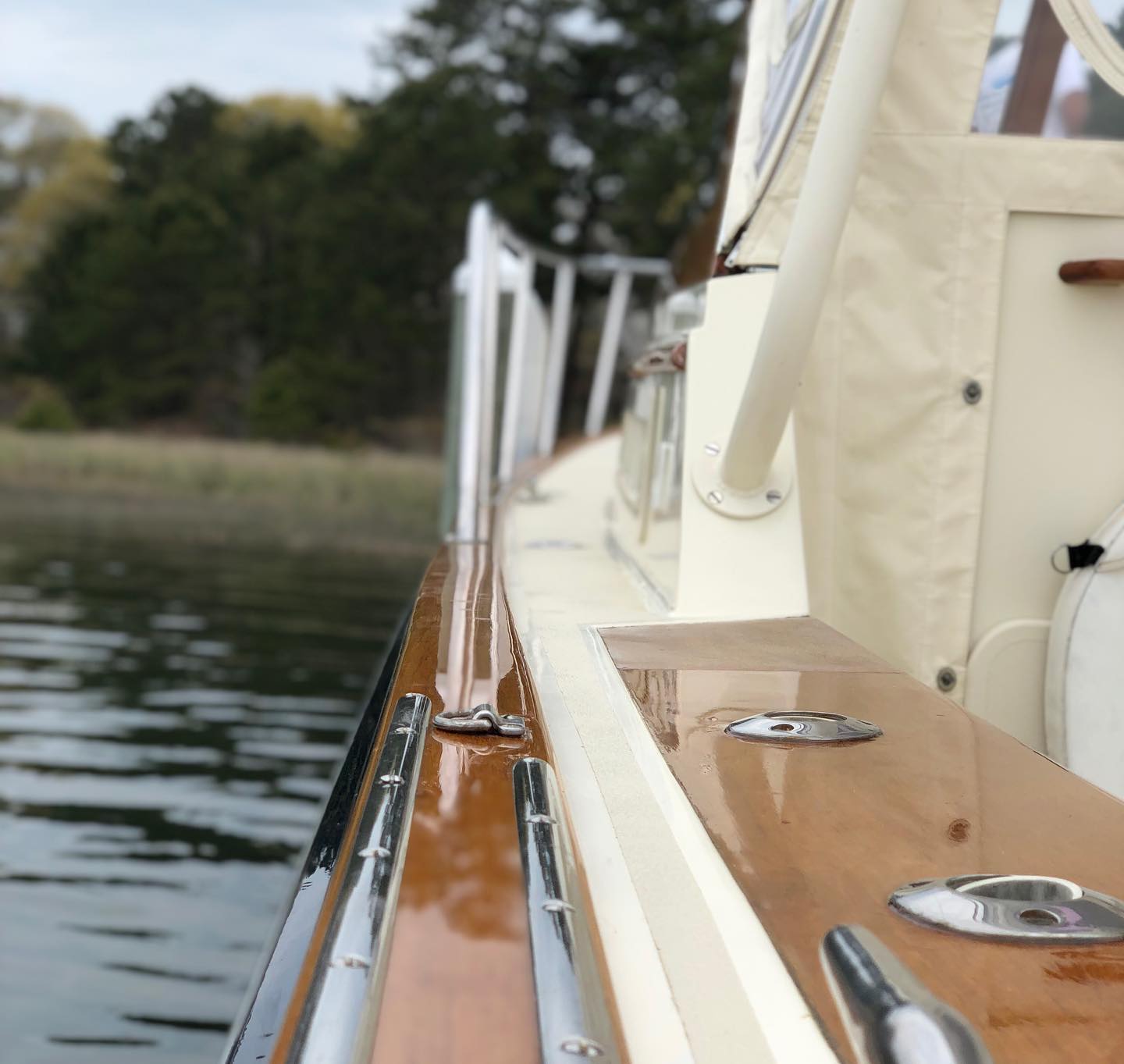 Boat with glossy wood railings